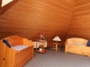 Schlafzimmer im Dachgeschoss 1